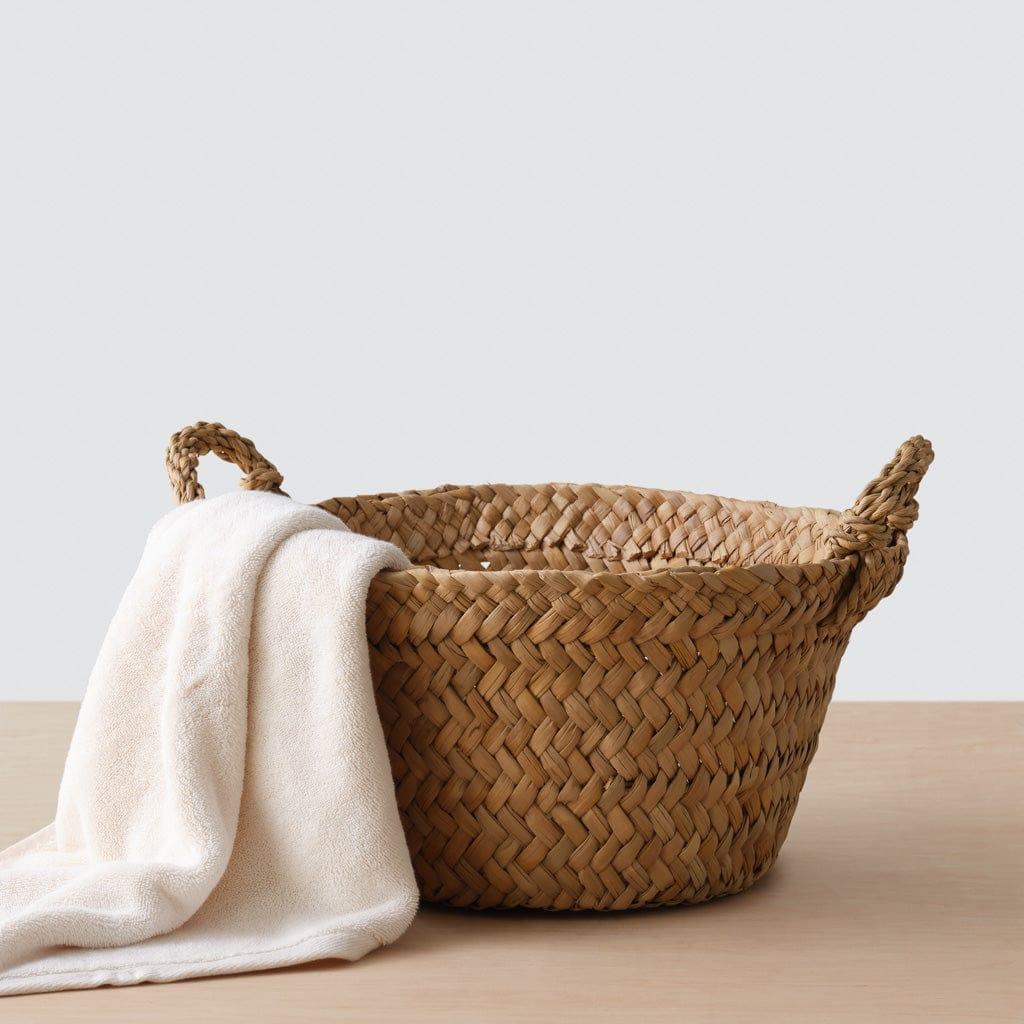 Throw laying out of woven floor basket
